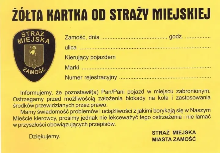 Żółta kartka od Straży Miejskiej Zamość. Czy straż miejska może dawać punkty karne? Nie, ale ostrzega przed blokadą koła.