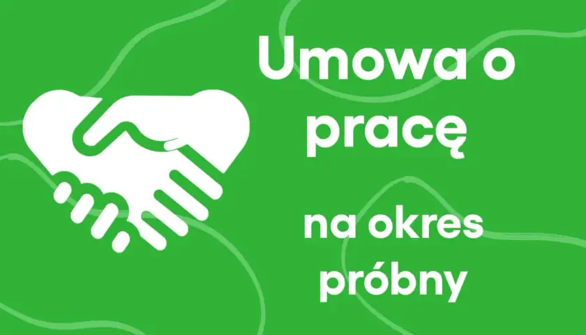 Białe dłonie ściskają się na zielonym tle, symbolizując umowę o pracę na okres próbny.