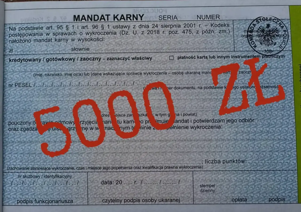 Mandat karny na 5000 zł, z czerwonym napisem